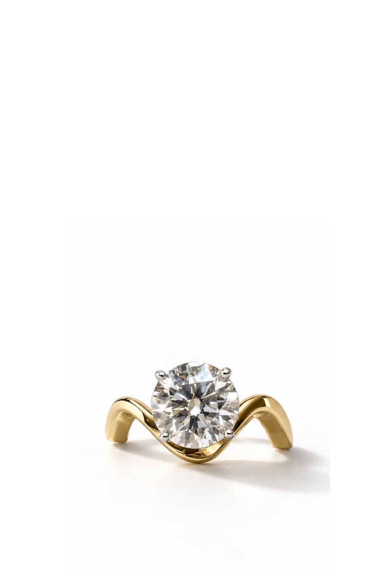 Anello Onda in Oro Giallo con Diamante Solitario