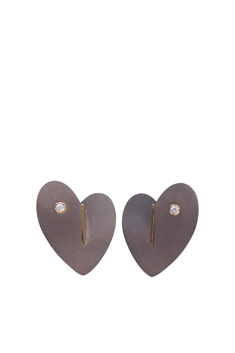 Wrong Heart Earrings in Titanium and Yellow Gold